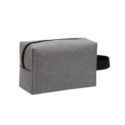 Interior layout of a minimalist travel toiletry organizer with smart compartments Interior layout of a minimalist travel toiletry organizer with smart compartments